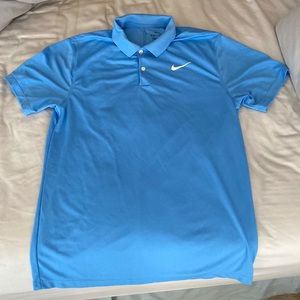 Light blue men’s Nike golf polo